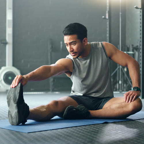 athlete-toe-reach-a-stretch-PhysioCare-Rehab-and-Wellness-Brandywine-MD